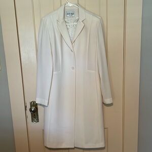 Classy & Timeless lace dress with matching long sleeved jacket.